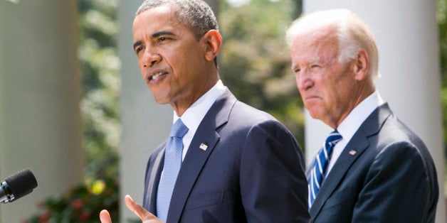 WASHINGTON, DC - AUGUST 31: (AFP OUT) U.S. President Barack Obama (L) joined by Vice President Joe Biden delivers a statement on Syria in the Rose Garden of the White House on August 31, 2013 in Washington, DC. Obama states that he will seek Congressional authorization for the U.S. to take military action following the events in Syria. (Photo by Kristoffer Tripplaar-Pool/Getty Images)