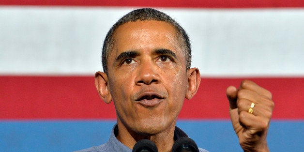 US President Barack Obama speaks on education at the Henninger High School on August 22, 2013 in Syracuse, New York. Obama is on a two-day bus tour through New York and Pennsylvania to discuss his plan to make college more affordable, tackle rising costs, and improve value for students and their families. AFP Photo/Jewel Samad (Photo credit should read JEWEL SAMAD/AFP/Getty Images)