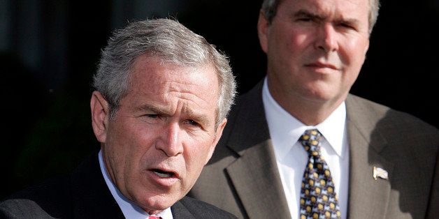 President George W. Bush is backed by his brother, Florida Gov. Jeb Bush, as he makes a statment at the White House's Rose Garden on Wednesday, April 19, 2006, about a visit to Iraq by U.S. governors. (Photo by Chuck Kennedy/MCT/MCT via Getty Images)