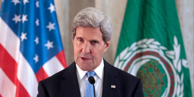 US Secretary of State John Kerry gives a speech on September 8, 2013 at the United States Embassy in Paris. Kerry continues a diplomatic offensive in Europe on September 8 to win backing for military strikes in Syria, after Washington and Paris said support for action was growing. Heading into a crucial week for US plans to launch the strikes, Kerry was meeting with Arab League ministers in Paris and was set to head to London next before returning to Washington on September 9 to continue rallying support at home. AFP PHOTO/ JACQUES DEMARTHON (Photo credit should read JACQUES DEMARTHON/AFP/Getty Images)