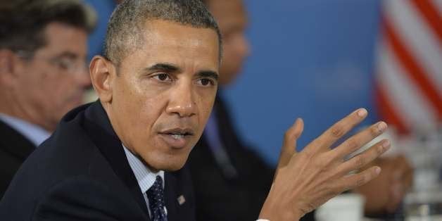 US President Barack Obama speaks during a bilateral meeting with Frances President at the G20 summit on September 6, 2013 in Saint Petersburg. World leaders at the G20 summit on Friday failed to bridge their bitter divisions over US plans for military action against the Syrian regime, with Washington signalling that it has given up on securing Russia's support at the UN on the crisis. AFP PHOTO / ERIC FEFERBERG (Photo credit should read ERIC FEFERBERG/AFP/Getty Images)