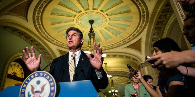 WASHINGTON, DC - JULY 9: Sen. Joe Manchin (D-WV) speaks during a press conference after meeting with fellow Democratic Senators, on Capitol Hill, July 9, 2013 in Washington, DC. Manchin spoke to reporters about student loan legislation. (Photo by Drew Angerer/Getty Images)