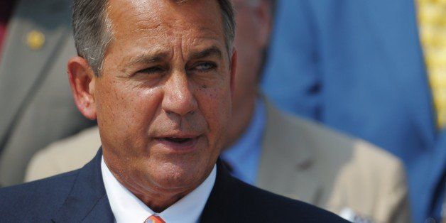House Speaker John Boehner (C) speaks during the 12th anniversary 9/11 Remembrance ceremonyon the East Steps of the US Capitol on September 11, 2013 in Washington, DC. AFP PHOTO/Mandel NGAN (Photo credit should read MANDEL NGAN/AFP/Getty Images)