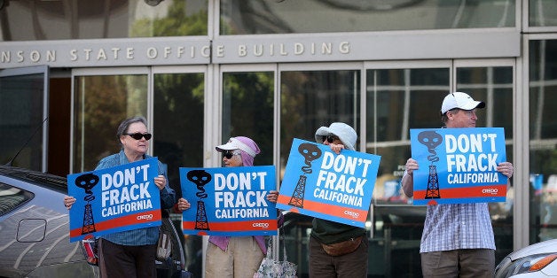 SAN FRANCISCO, CA - MAY 30: Protestors stage a demonstration against fracking in California outside of the Hiram W. Johnson State Office Building on May 30, 2013 in San Francisco, California. Dozens of protesters with the group Californians Against Fracking staged a protest outside of California Gov. Jerry Brown's San Francisco offices demanding that Gov. Brown ban fracking in the state. (Photo by Justin Sullivan/Getty Images)