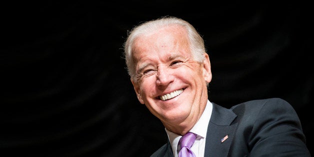 US Vice President Joe Biden smiles during a farewell ceremony during a farewell ceremony for Homeland Security Secretary Janet Napolitano at the Ronald Reagan Building September 6, 2013 in Washington, DC. Napolitano is leaving her post to become president of the University of California system. AFP PHOTO/Brendan SMIALOWSKI (Photo credit should read BRENDAN SMIALOWSKI/AFP/Getty Images)