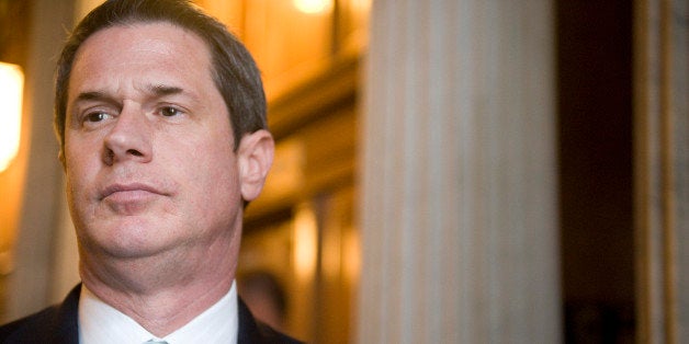 UNITED STATES - MARCH 10: Sen. David Vitter, R-La., answers questions from reporters as he heads into the Senate Republican