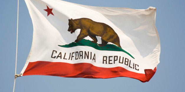 'Subject: California state flag flying in the breezeLocation: California, U.S.A.'