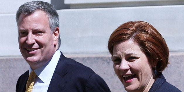 NEW YORK, NY - SEPTEMBER 17: Christine Quinn (R), New York City Council Speaker and former mayoral hopeful, smiles with Democratic Party nominee Bill de Blasio, while entering a news conference where Quinn endorsed de Blasio outside City Hall on September 17, 2013 in New York City. De Blasio will face Republican Joseph Lhota in the general mayoral election November 5, 2013, with the winner succeeding current Mayor Michael Bloomberg. (Photo by Mario Tama/Getty Images)