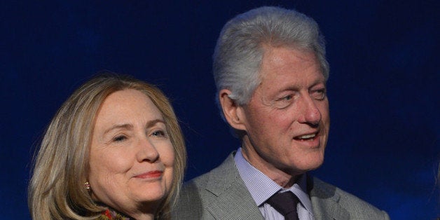 NEW YORK, NY - APRIL 04: Former US President Bill Clinton and Former US Secretary of State Hillary Clinton attend SeriousFun Children's Network event honoring Liz Robbins with celebrity guests at Pier Sixty at Chelsea Piers on April 4, 2013 in New York City. (Photo by Larry Busacca/Getty Images for SeriousFun Children's Network)