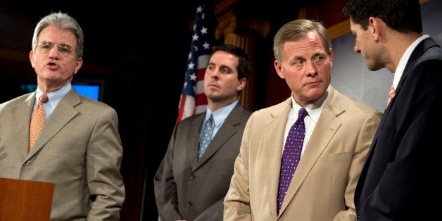 UNITED STATES - MAY 20: From left, Sen. Tom Coburn, R-Okla., Rep. Devin Nunes, R-Calif., Sen. Richard Burr, R-N.C., and Rep. Paul Ryan, R-Wisc., conduct a news conference on 'The Patients' Choice Act of 2009,' May 20, 2009. (Photo By Tom Williams/Roll Call/Getty Images)