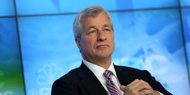 James 'Jamie' Dimon, chief executive officer of JPMorgan Chase & Co., listens during a panel discussion on the opening day of the World Economic Forum (WEF) in Davos, Switzerland, on Wednesday, Jan. 23, 2013. World leaders, Influential executives, bankers and policy makers attend the 43rd annual meeting of the World Economic Forum in Davos, the five day event runs from Jan. 23-27. Photographer: Chris Ratcliffe/Bloomberg via Getty Images 