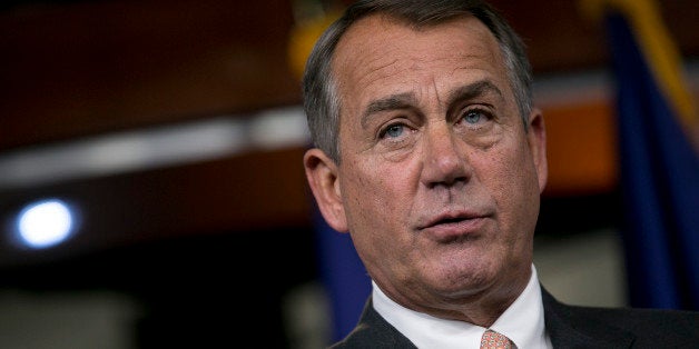 House Speaker John Boehner, a Republican from Ohio, speaks during a news conference in Washington, D.C., U.S., on Thursday, Sept. 12, 2013. House Republican leaders are struggling to avoid a U.S. government shutdown at month's end after delaying a vote on a spending plan opposed by dozens of their caucus members. Photographer: Andrew Harrer/Bloomberg via Getty Images 