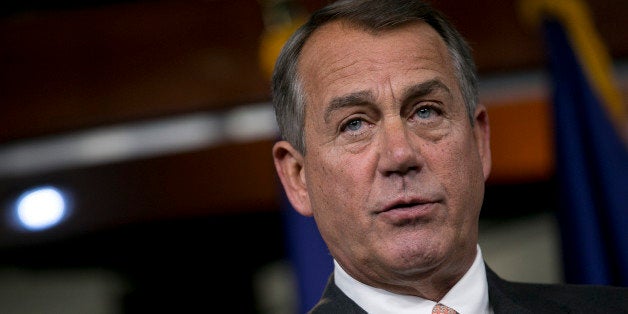 House Speaker John Boehner, a Republican from Ohio, speaks during a news conference in Washington, D.C., U.S., on Thursday, Sept. 12, 2013. House Republican leaders are struggling to avoid a U.S. government shutdown at month's end after delaying a vote on a spending plan opposed by dozens of their caucus members. Photographer: Andrew Harrer/Bloomberg via Getty Images 