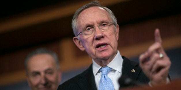 Senator Harry Reid, a Democrat from Nevada and Senate majority leader, right, speaks during a news conference with Senator Charles 'Chuck' Schumer, a Democrat from New York, in Washington, D.C., U.S., on Thursday, Sept. 26, 2013. The Senate is accelerating debate on a bill that would avert a U.S. government shutdown as Senate Republicans sought to buy time for their House counterparts to take another swipe at President Barack Obama's health-care law. Photographer: Andrew Harrer/Bloomberg via Getty Images 