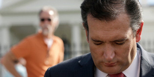 WASHINGTON, DC - SEPTEMBER 26: U.S. Sen. Ted Cruz (R-TX) prays with members of the Christian Defense Coalition outside the W
