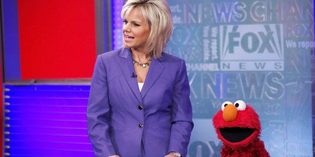 NEW YORK - NOVEMBER 18: Elmo and host Gretchen Carlson visits 'FOX & Friends' at the FOX Studios on November 18, 2010 in New York City. (Photo by Neilson Barnard/Getty Images)