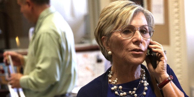 WASHINGTON, DC - JUNE 12: U.S. Sen. Barbara Boxer (D-CA) talks on her cellular phone prior to a news conference June 12, 201