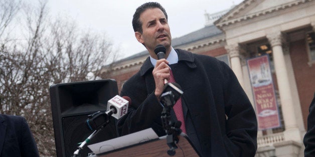 UNITED STATES - JANUARY 17: Rep. John Sarbanes, D-Md., joined other Maryland politicians and community leaders at a rally in front of the Maryland State House to 'fight secret spending in our democracy' by supporting the 'DISCLOSE Act.' The act would increase disclosure and transparency of campaign donations. The rally also protested the third anniversary of the Supreme Court?s controversial Citizens United ruling, which, according to the the rally organizers, 'has flooded the American electoral process with secret special interest money.' (Photo By Chris Maddaloni/CQ Roll Call)