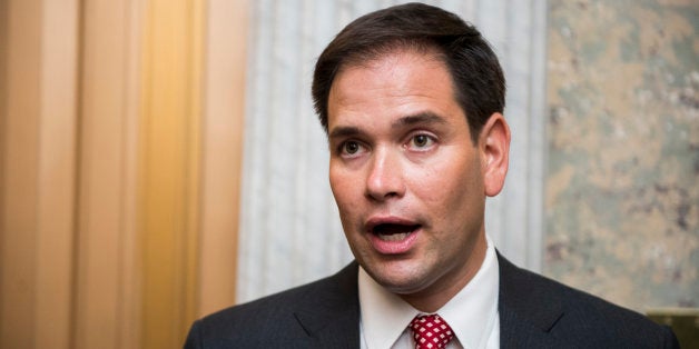 UNITED STATES - MAY 7: Sen. Marco Rubio, R-Fla., speaks with reporters outside of the Senate floor in the Capitol on Tuesday, May 7, 2013. (Photo By Bill Clark/CQ Roll Call)