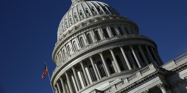 WASHINGTON, DC - SEPTEMBER 29: The United States Capitol building is seen as Congress remains gridlocked over legislation to continue funding the federal government September 29, 2013 in Washington, DC. The House of Representatives passed a continuing resolution with language to defund U.S. President Barack Obama's national health care plan yesterday, but Senate Majority Leader Harry Reid has indicated the U.S. Senate will not consider the legislation as passed by the House. (Photo by Win McNamee/Getty Images)