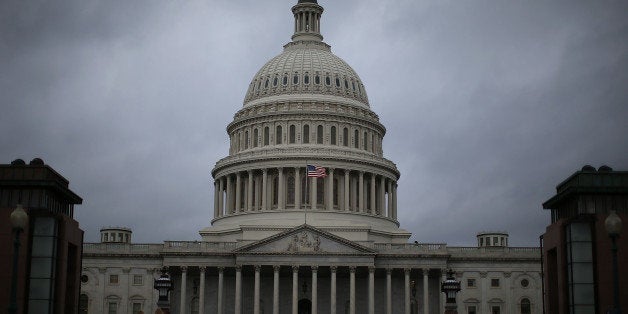 WASHINGTON, DC - OCTOBER 07: Clouds fill the sky in front of the U.S. Capitol on October 7, 2013 in Washington, DC. Democrats