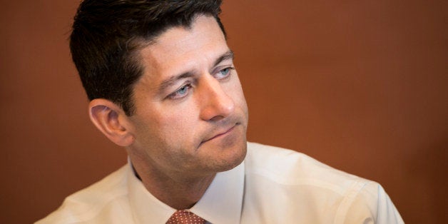 Rep. Paul Ryan (R-WI) listens while speaking to the press with other House Republican conferees on Capitol Hill October 1, 2013 in Washington, DC. The US government is in a forced shutdown after lawmakers failed to pass a spending bill last night. AFP PHOTO/Brendan SMIALOWSKI (Photo credit should read BRENDAN SMIALOWSKI/AFP/Getty Images)