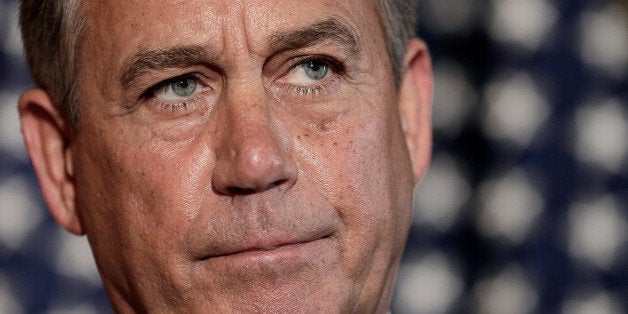 WASHINGTON, DC - OCTOBER 08: Speaker of the House John Boehner (R-OH) responds to U.S. President Barack Obama's comments at the U.S. Capitol October 8, 2013 in Washington, DC. The U.S. government shutdown is entering its eighth day as the U.S. Senate and House of Representatives remain gridlocked on funding the federal government. (Photo by Win McNamee/Getty Images)