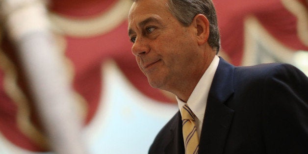 WASHINGTON, DC - OCTOBER 09: House Speaker John Boehner (R-OH) walks through Statuary Hall at the U.S. Capitol, October 9, 2013 in Washington, DC. The U.S. government shutdown is entering its ninth day as the U.S. Senate and House of Representatives remain gridlocked on funding the federal government. (Photo by Mark Wilson/Getty Images)