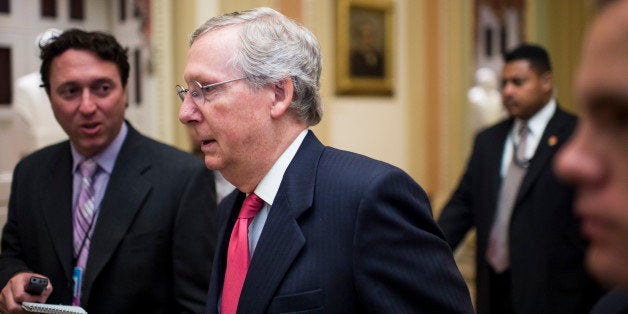 UNITED STATES - OCTOBER 8: Senate Minority Leader Mitch McConnell, R-Ky., walks to the Senate Republicans' policy lunch in the Capitol on Tuesday, Oct. 8, 2013. (Photo By Bill Clark/CQ Roll Call)