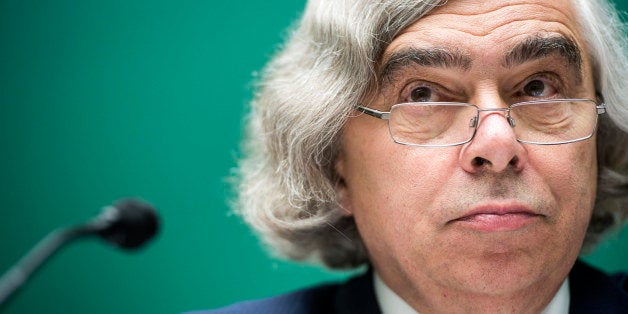 US Secretary of Energy Ernest Moniz listens during a hearing of the House Energy and Commerce Committee's Environment and the Economy Subcommittee on Capitol Hill July 31, 2013 in Washington, DC. The subcommittee held the hearing about the US Department of Energy's plan for disposal of used nuclear fuel and radioactive waste at Yucca Mountain or other facilities. AFP PHOTO/Brendan SMIALOWSKI (Photo credit should read BRENDAN SMIALOWSKI/AFP/Getty Images)