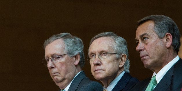 WASHINGTON, DC - JUNE 19: (L-R) Senate Minority Leader Mitch McConnell (R-KY), Senate Majority Leader Harry Reid (D-NV), and Speaker of the House John Boehner (R-OH) are seen during a dedication ceremony for the new Frederick Douglass Statue in Emancipation Hall in the Capitol Visitor Center, at the U.S. Capitol, on June 19, 2013 in Washington, DC. The 7 foot bronze statue of Douglass joins fellow black Americans Rosa Parks, Martin Luther King Jr. and Sojourner Truth on permanent display in the Capitol's Emancipation Hall. (Photo by Drew Angerer/Getty Images)