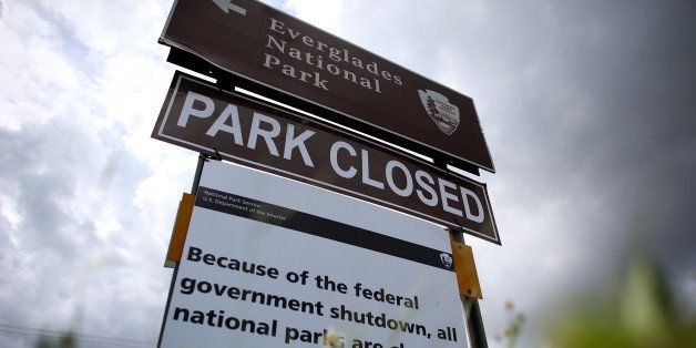 MIAMI, FL - OCTOBER 07: A sign near the entrance to the Everglades National Park is seen indicating it is closed on October 7, 2013 in Miami, Florida. The park is closed as the United States House and Senate are into day 7 of not being able to agree on a bill to fund the United States government. National Parks around the nation are closed along with other federal services. (Photo by Joe Raedle/Getty Images)