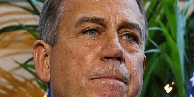 WASHINGTON, DC - OCTOBER 15: House Speaker John Boehner (R-OH) (C) speaks to the media following a House Republican caucus meeting at the U.S. Capitol, October 15, 2013 in Washington, DC. With the government shutdown going into the fifttenth day and the deadline for raising the debt ceiling fast approaching, Democrats and Republicans may come to an agreement soon on passing a budget. (Photo by Mark Wilson/Getty Images)