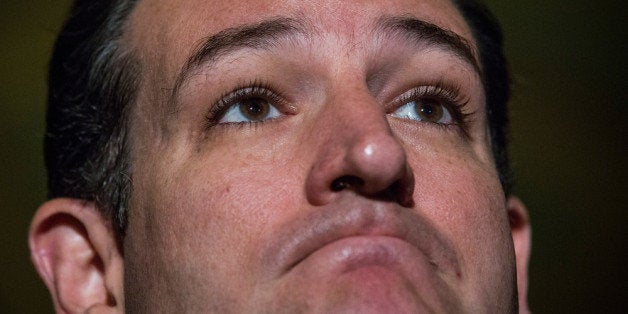 WASHINGTON, DC - OCTOBER 16: U.S. Sen. Ted Cruz (R-TX) answers questions from the media after meeting with Republican senators regarding a bipartisan solution for the pending budget and debt limit impasse at the U.S. Capitol October 16, 2013 in Washington, DC. The Senate announced that it had reached a bipartisan deal on funding the federal government and the extending the nation's debt limit after 16 days of a government shutdown. (Photo by Andrew Burton/Getty Images)