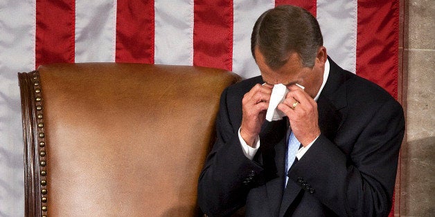 House Speaker John Boehner, right, gets teary-eyed as House Minority Leader Nancy Pelosi, speaks during the 112th Congress convenes in Washington, D.C., U.S., on Wednesday, Jan. 5, 2010. Boehner is promising to 'give government back to the people' and make 'tough decisions' to cut spending as he becomes the U.S. House of Representatives' 53rd speaker today. Photographer: Joshua Roberts/Bloomberg via Getty Images