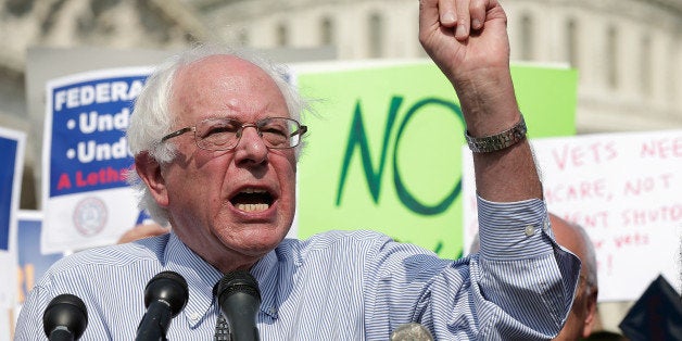 WASHINGTON, DC - OCTOBER 04: Sen. Bernie Sanders (I-VT) speaks during a protest held by furloughed federal workers outside the U.S. Capitol to demand an end to the lockout of federal workers caused by the government shutdown October 4, 2013 in Washington, DC. Today marks the fourth day of the government shutdown as Republicans and Democrats remain at an impasse over funding the federal government. (Photo by Win McNamee/Getty Images)