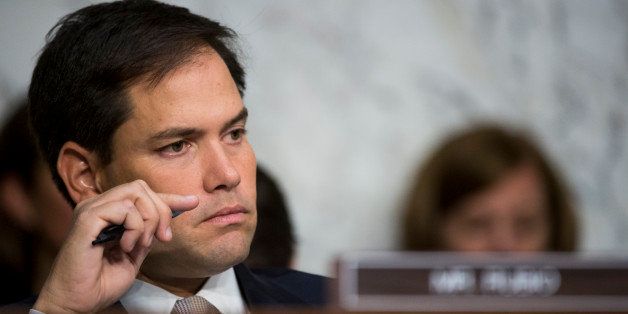 UNITED STATES - SEPTEMBER 4: Sen. Marco Rubio, R-Fla., listens during the Senate Foreign Relations committee markup of the bill authorize for use of military force in Syria on Wednesday, Sept. 4, 2013. (Photo By Bill Clark/CQ Roll Call)
