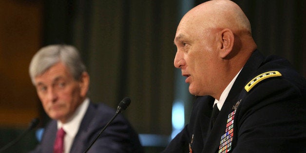 WASHINGTON, DC - APRIL 23: Chief of Staff of the U.S. Army Gen. Raymond Odierno (R), and Secretary of the Army John McHugh speak before the Senate Armed Services Committee, on April 23, 2013 in Washington, DC. The committee is hearing testimony on the Department of the Army budget request for FY2014. (Photo by Mark Wilson/Getty Images)