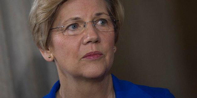 Senator Elizabeth Warren, a Democrat from Massachusetts, listens to a question during a Bloomberg Television interview in Washington, D.C., U.S., on Monday, Sept. 16, 2013. Warren said it is 'No secret Larry Summers was not my first choice' for Federal Reserve chairman and she is a 'big fan' of Janet Yellen for the Fed chairman position. Photographer: Andrew Harrer/Bloomberg via Getty Images 