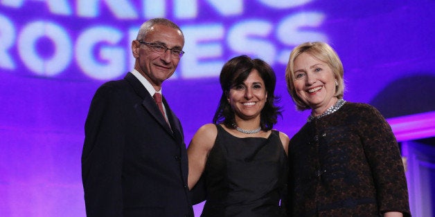 WASHINGTON, DC - OCTOBER 24: (L-R) Center for American Progress co-founder John Podesta, center President Neera Tanden and former Secretary of State Hillary Clinton pose for photographs during a gala celebrating the 10th anniversary of the center wit co-founder John Podesta (L) at the Mellon Auditorium October 24, 2013 in Washington, DC. The center, a liberal public policy research and advocacy organization, is a think tank that rivals conservative policy groups, such as the Heritage Foundation and the American Enterprise Institute. (Photo by Chip Somodevilla/Getty Images)