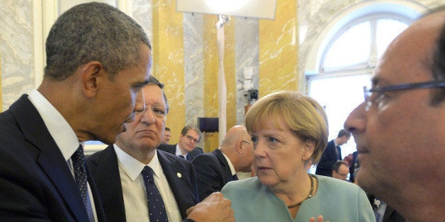 SAINT PETERSBURG, RUSSIA - SEPTEMBER 06: In this handout image provided by Host Photo Agency, (L-R) U.S. President Barack Obama, European Commission President Jose Manuel Barroso, German Chancellor Angela Merkel and French President Francois Hollande attend the second working meeting during the G20 Leaders' Summit on September 6, 2013 in St. Petersburg, Russia. Leaders of the G20 nations made progress on tightening up on multinational company tax avoidance, but remain divided over the Syrian conflict at the of the Russian summit. (Photo by Sergey Guneev/Host Photo Agency via Getty Images)