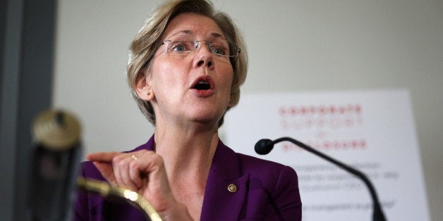 WASHINGTON, DC - OCTOBER 30: U.S. Sen. Elizabeth Warren (D-MA) speaks during a briefing on a Securities and Exchange Commission proposed rule October 30, 2013 on Capitol Hill in Washington, DC. The Corporate Reform Coalition and Public Citizen held a briefing on a SEC proposed rule that would 'require publicly traded companies to disclose funds spent with the purpose of influencing elections.' (Photo by Alex Wong/Getty Images)