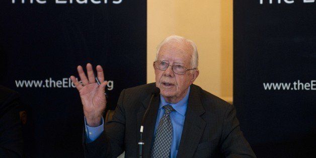 Former US President Jimmy Carter speaks during a news conference, held at the end of a three-day visit to the formerly military-ruled country by the group known as 'The Elders', for talks with reformist President Thein Sein, religious leaders and civil society groups in Yangon on September 26, 2013. Former world leaders led by ex-US president Jimmy Carter appealed on September 26 for an end to impunity over a wave of anti-Muslim attacks in Myanmar. AFP PHOTO / Ye Aung THU (Photo credit should read Ye Aung Thu/AFP/Getty Images)