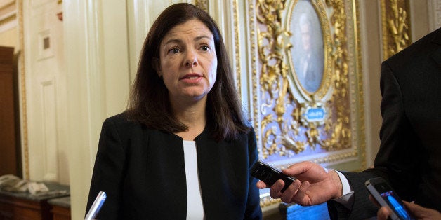 US Senator Kelly Ayotte, R-NH, walks to the weekly policy luncheon on Capitol Hill in Washington, DC, October 15, 2013. Washington's risky game of political brinkmanship neared crisis point Tuesday, with no deal yet nailed down to avoid a catastrophic US debt default, just 36 hours before a crucial deadline. Despite global fears that the US government could run out of money to pay its bills on Thursday, the rift cleaving US politics and a fight for the soul of the Republican Party thwarted compromise. Hopes a nascent deal between Republicans and Democrats in the Senate would open the way to resolve a fight over raising the US borrowing limit and reopening government proved over optimistic. AFP PHOTO / Jim WATSON (Photo credit should read JIM WATSON/AFP/Getty Images)