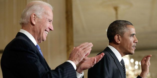 WASHINGTON, DC - OCTOBER 24: U.S. President Barack Obama (R) speaks at an event on immigration reform with Vice President Joe Biden (L) in the East Room of the White House October 24, 2013 in Washington, DC. Obama urged the House of Representatives to pass immigration reform legislation already approved by the U.S. Senate during his remarks. (Photo by Win McNamee/Getty Images)