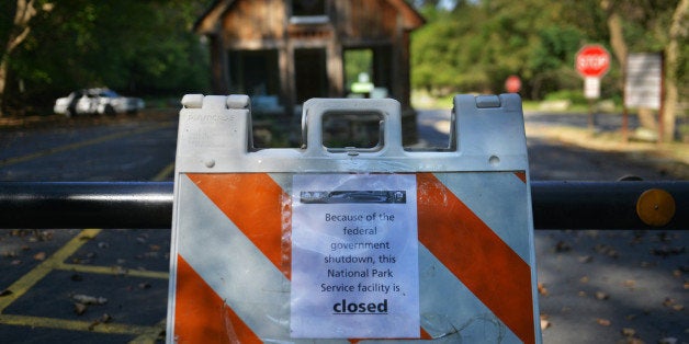 Great Falls, VA - OCTOBER 2:The closed entrance of Great Falls Park (U. S. National Park Service) on Wednesday, October 2, 2013, in Great Falls, VA. The park is closed due to the partial shutdown of the United States government, where hundreds of thousands of workers at non-essential services, including rangers in national parks, have been told to take unpaid leave from their jobs. George and Joan Eckert, who live in the area, came to the park after forgetting it was affected by the shutdown. Joan Eckert said, 'We're just disgusted with the situation. It's one of the most pathetic thingsour government is not working.' Her husband George Eckert added, 'It's a gorgeous day, incredible weather, eighty-five degrees in October. This is the closest place to get out and enjoy the park, and this is what we pay taxes for, to have a park that you could get out to on a nice dayour only alternative is to go to a county park, and that's what we're going to do.' Joan Eckert added, 'It's really sadnormal, ordinary, simple people are very upset by everything that's going on.' (Photo by Jahi Chikwendiu/The Washington Post via Getty Images)