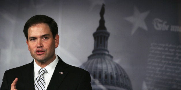 WASHINGTON, DC - OCTOBER 30: U.S. Sen. Marco Rubio (R-FL) speaks to members of the media during a press conference October 30, 2013 on Capitol Hill in Washington, DC. Sen. Rubio joined Sen. Ron Johnson (R-WI) and Rep. Ron DeSantis (R-FL) at a news conference to introduce their joint legislation, the If You Like Your Health Care Plan You Can Keep It Act. (Photo by Alex Wong/Getty Images)