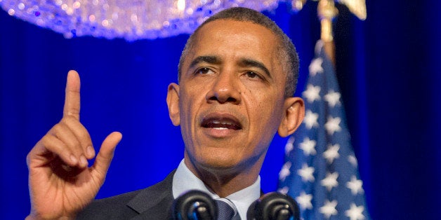 WASHINGTON, DC - NOVEMBER 04: US President Barack Obama delivers remarks at an Organizing for Action 'Obamacare Summit' at t
