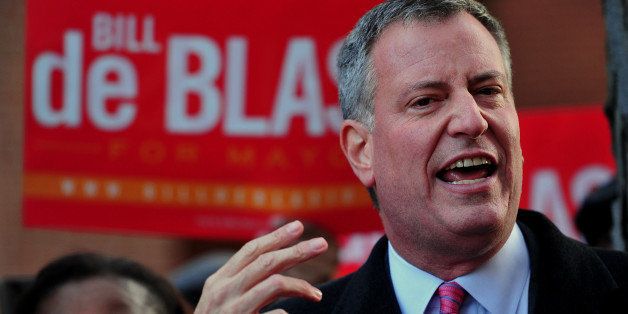 New York City Democratic mayoral candidate Bill de Blasio campaigns in the Queens borough of New York November 4, 2013. AFP PHOTO/Stan HONDA (Photo credit should read STAN HONDA/AFP/Getty Images)