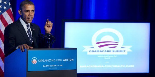 US President Barack Obama speaks about the healthcare reform laws, known as Obamacare, at an Organizing for Action event in Washington, DC, November 4, 2013. AFP PHOTO / Saul LOEB (Photo credit should read SAUL LOEB/AFP/Getty Images)